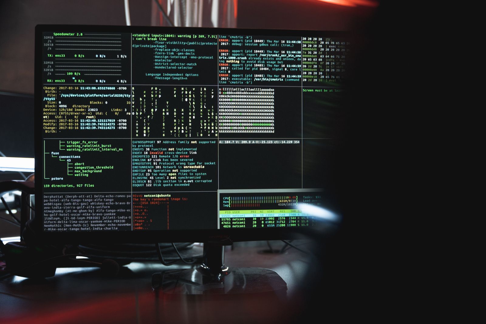 Monitor showing security data and code